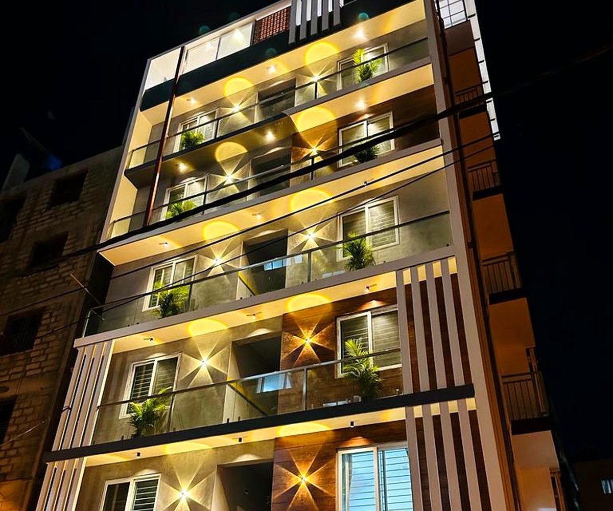 Completed residential apartment building in Marathahalli, Bangalore, lit up at night